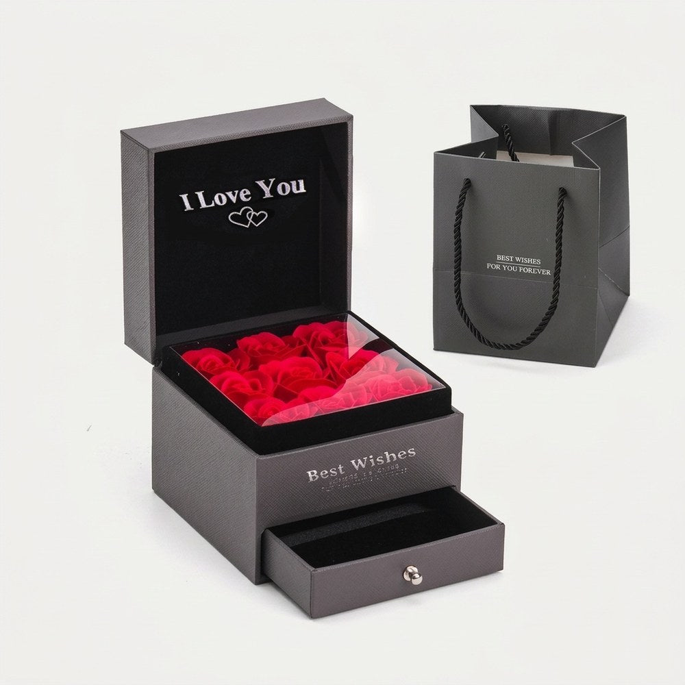 Boîte cadeau bijou avec roses éternelles, vue produit sur fond neutre