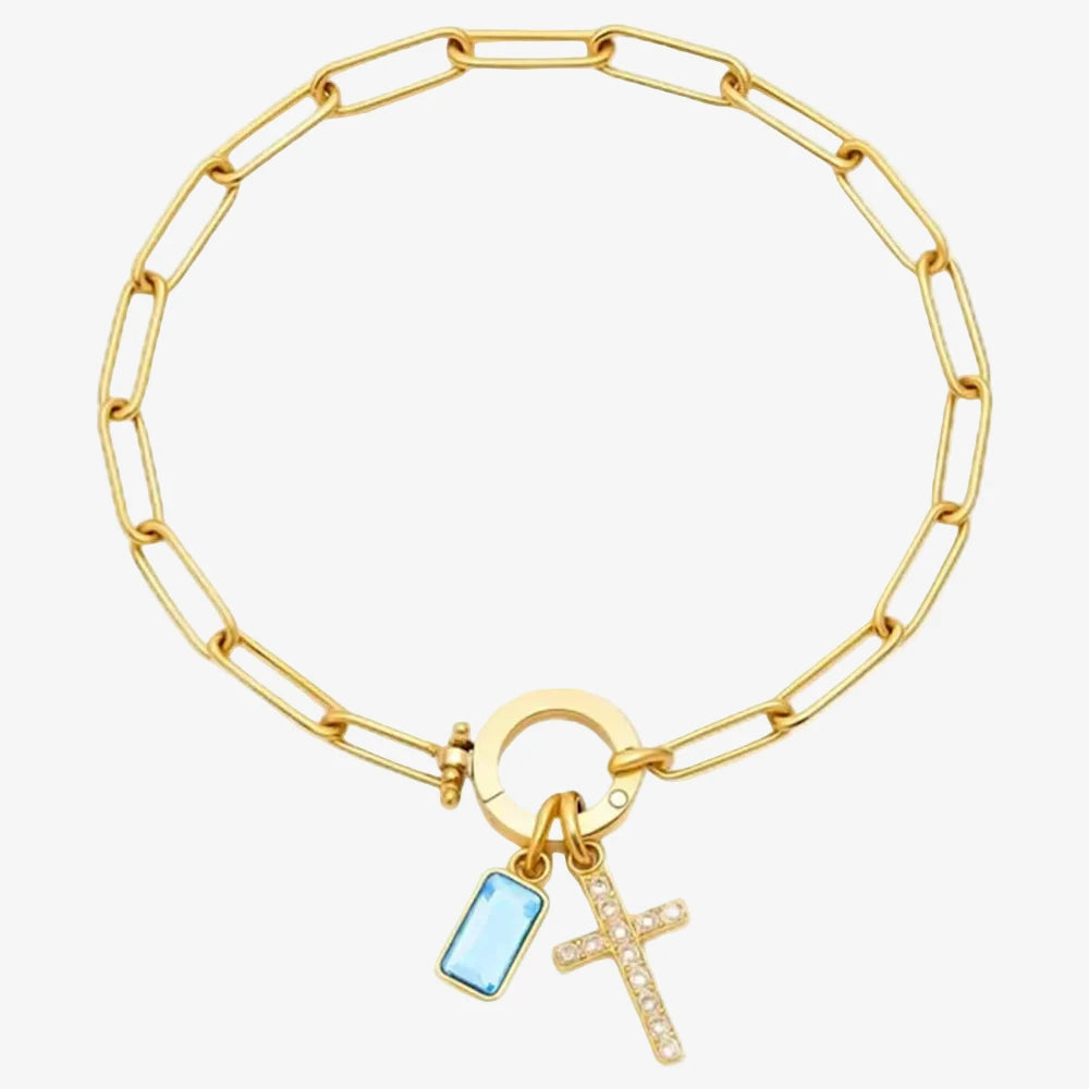 Pierre de naissance Mars sur une chaine a maillons large et une croix sur un fond neutre