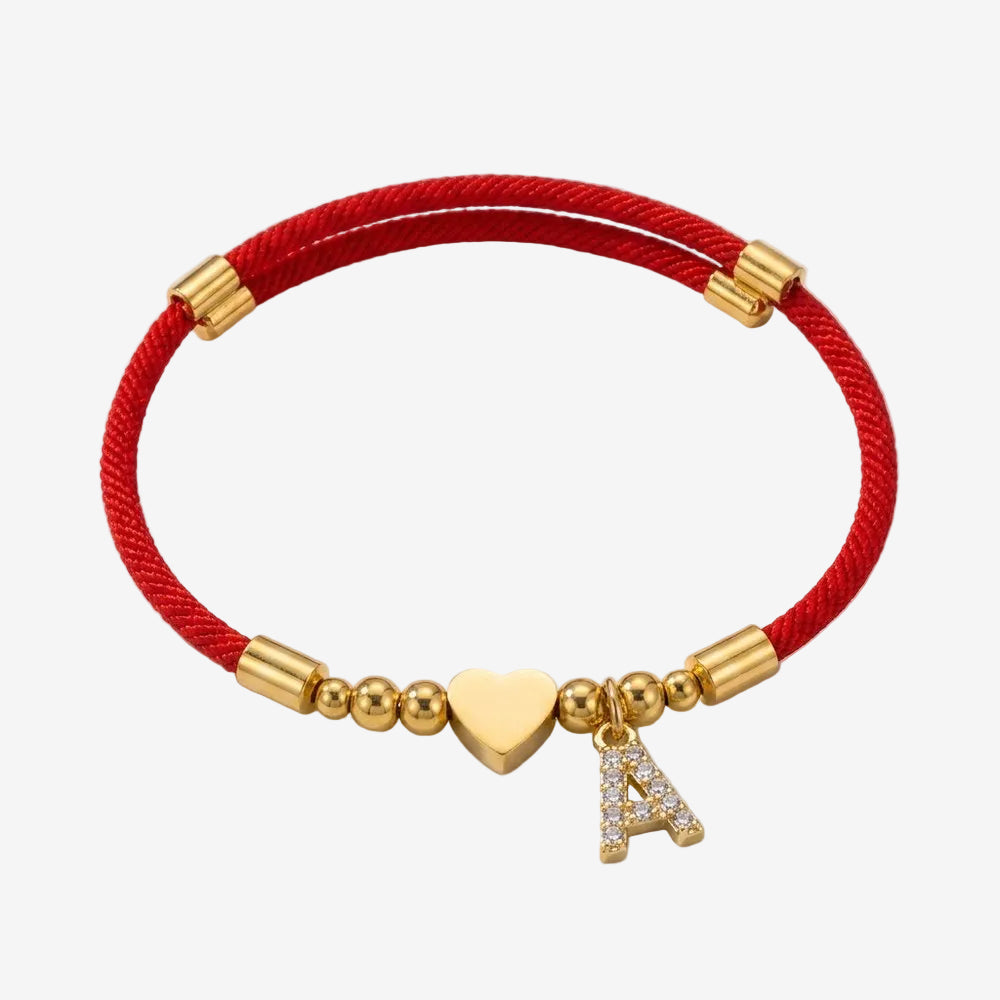 Bracelet cœur en corde rouge, vue produit sur fond neutre