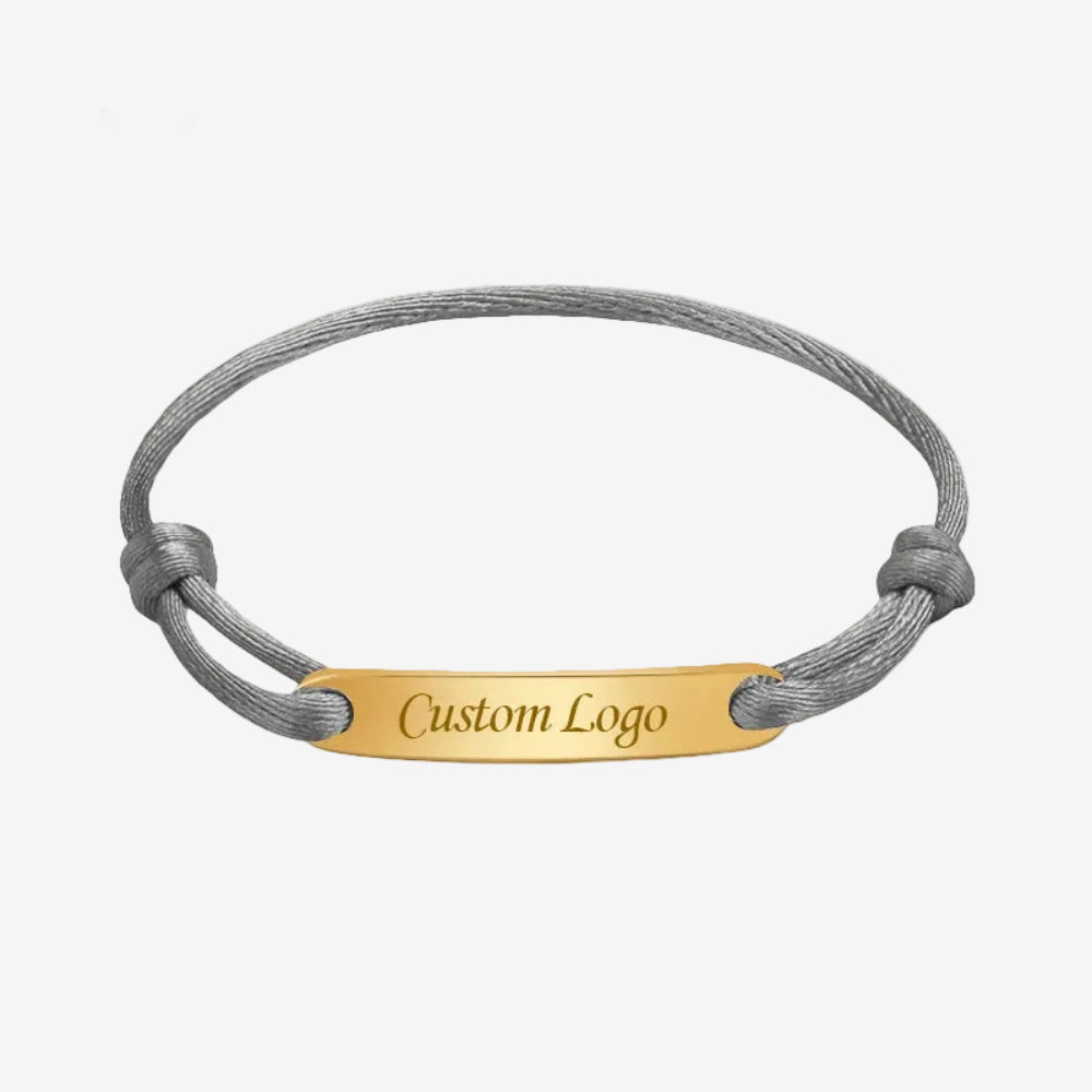 Bracelet noeud coulissant gris avec une plaque personnalisable