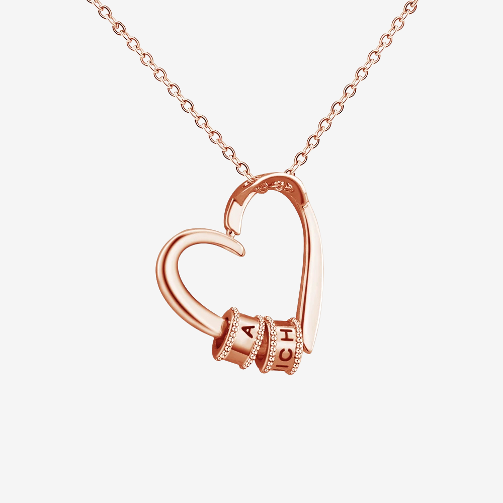 Collier cœur en or rose, pendentif cœur ouvert avec anneaux gravés d'initiales